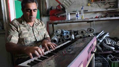 ELAZIĞ SANAYİSİNDE OTO TAMİR VE EGZOZ USTASI OLAN MEHMET AKBULUT,