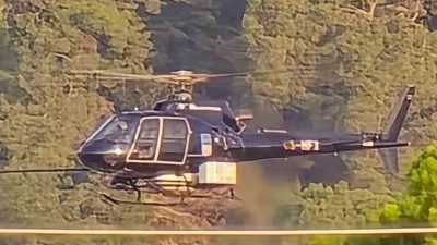 MUĞLA'NIN MARMARİS İLÇESİNDE SABAH SAATLERİNDE HAVADA BİR HELİKOPTERİN YÜKSEK GERİLİM
