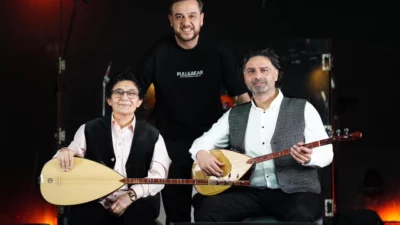 Bursa Gemlikli sanatçı Ahmet Gültekin, halk müziği sanatçısı Güler Duman